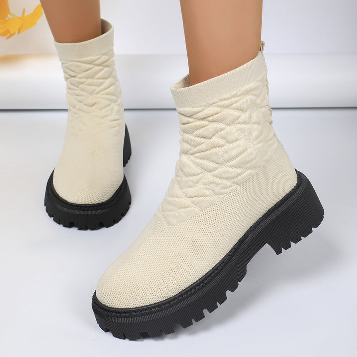 Damen Strick-Sockenboots mit geometrischer Stepp-Optik und klobiger Lug-Sohle Echoarchiv