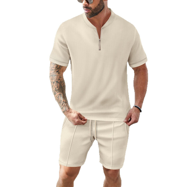 Herren sportliches Kurzarm-Set mit atmungsaktiven Materialien und modernem Schnitt Echoarchiv