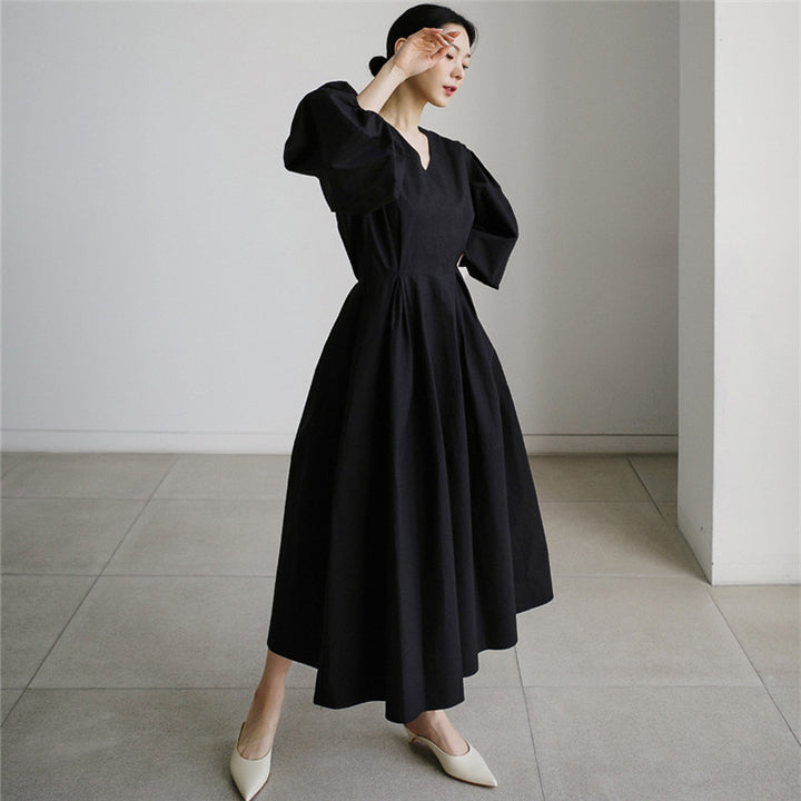 Damen Maxikleid mit weiten Ballonärmeln und seitlichen Eingrifftaschen Echoarchiv
