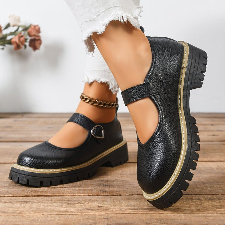 Damen Riemchen‑Slipper im Mary‑Jane‑Stil mit grober Profilsohle und Herzschließe Echo Archiv