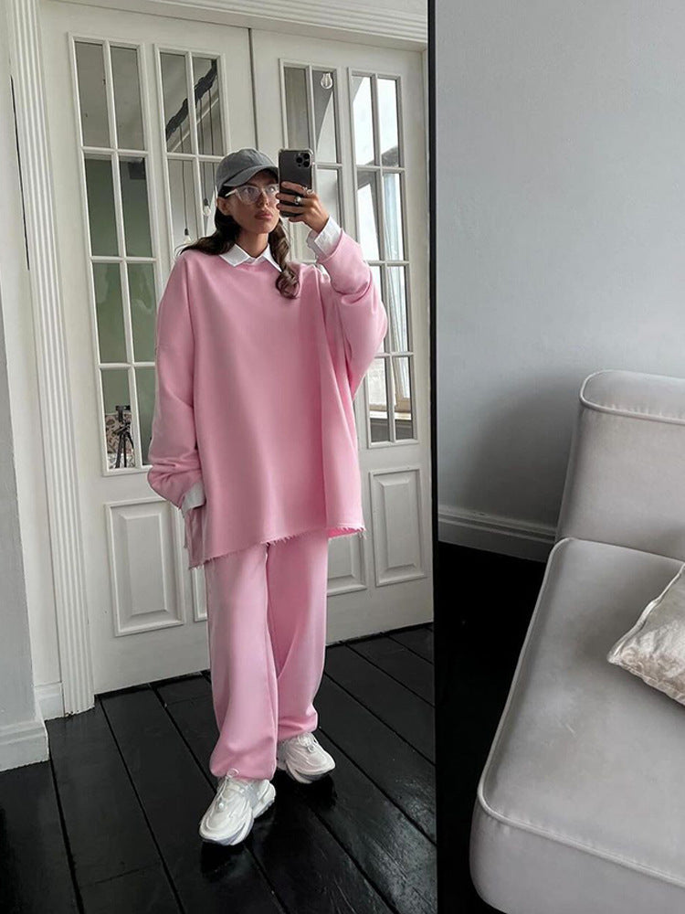 Damen oversized Lounge-Set mit ausgefranstem Saum, extra langem Sweatpullover und weiter hochgeschnittener Jogginghose – Avérine