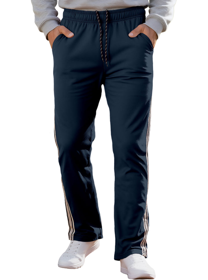 Herren nan Retro-Trackhose mit schmal zulaufendem Bein elastischem Bund Tunnelzug und seitlichen Streifen Echo Archiv