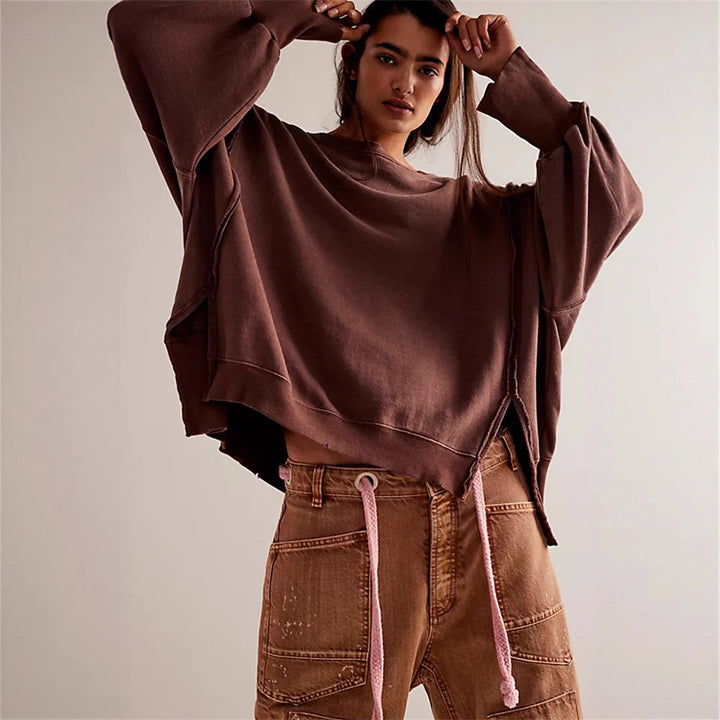 Damen oversized Sweatshirt mit Ballonärmeln, offenen Saumnähten und seitlichen Schlitzen – Avérine
