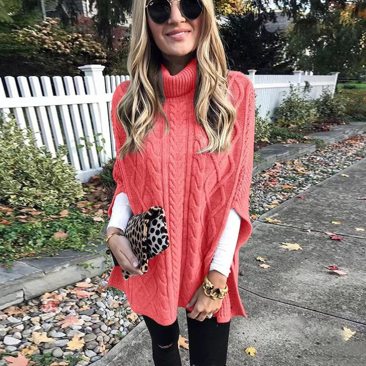 Damen nan kastiger Strickponcho mit hohem Rollkragen, Zopfstruktur und seitlichen Schlitzen Echo Archiv