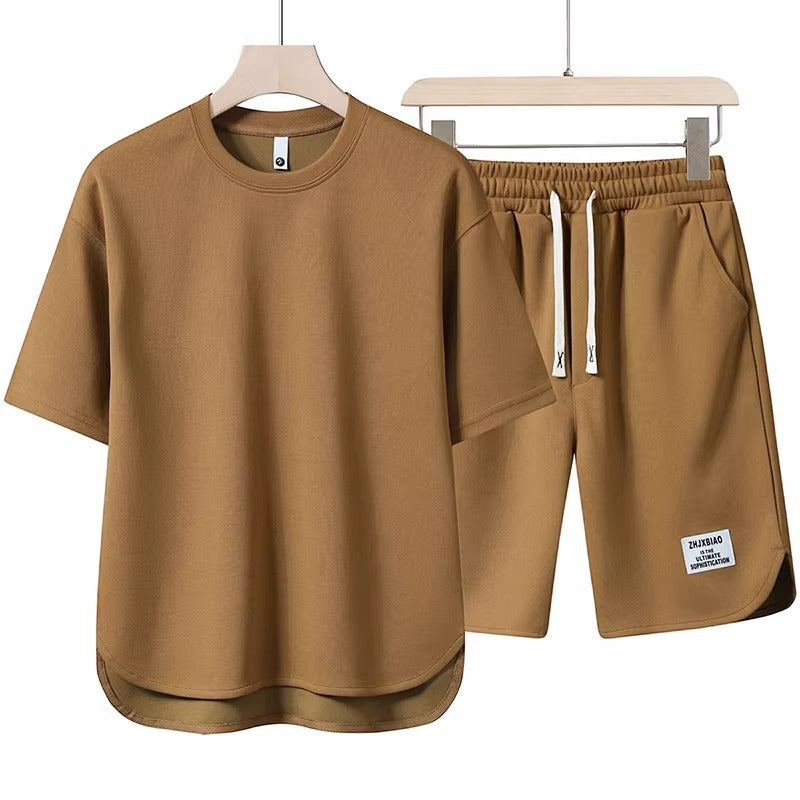 Unisex lässiges Set aus T-Shirt und Shorts mit seitlichen Taschen und elastischem Bund Echoarchiv