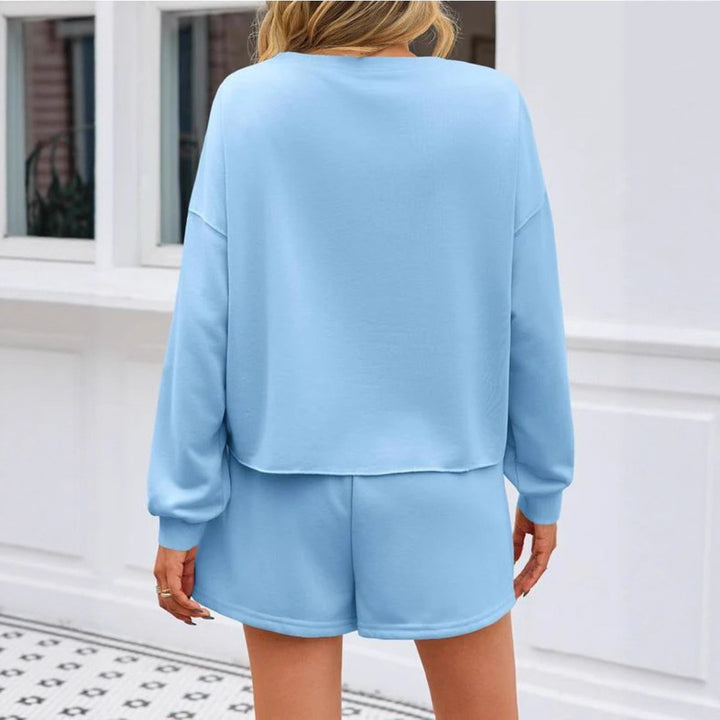 Damen nan perlenbesetztes Sweat-Set mit überschnittenem Pullover und ausgestelltem Minirock Echo Archiv