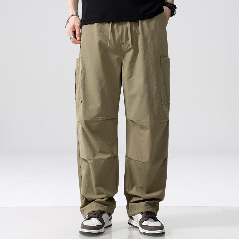 Herren Weite Cargohose im Utility‑Stil mit Kordelzug und aufgesetzten Beintaschen Echoarchiv