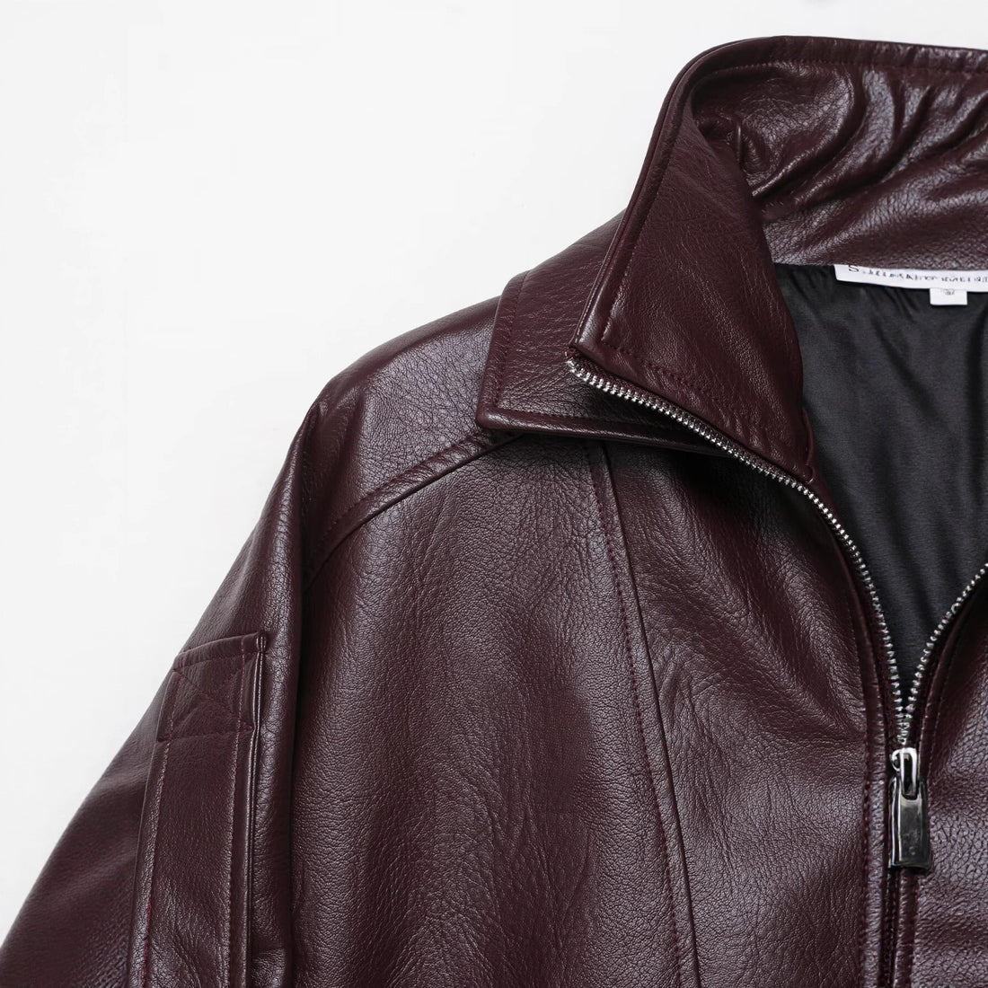 Damen Oversized Lederjacke im Bomberstil mit Taillengürtel Echoarchiv