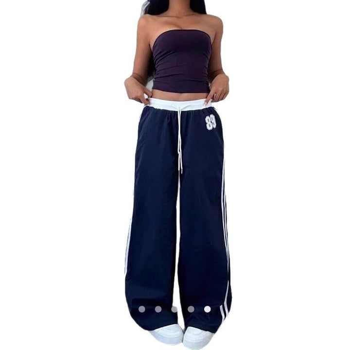 Damen Sportliche Jogginghose mit seitlichen Streifen Echo Archiv