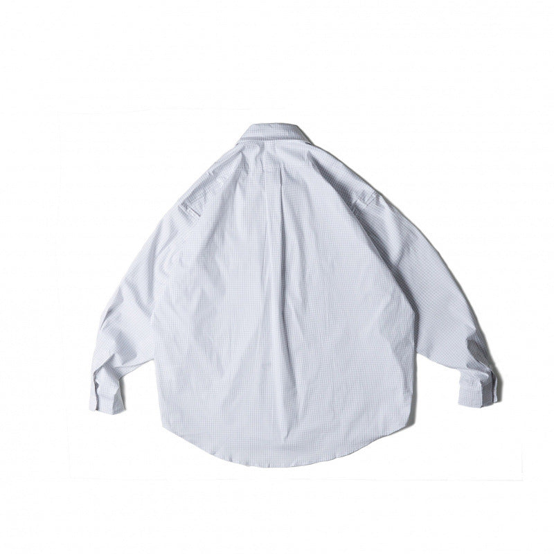 Unisex Oversize-kariertes Hemd mit rundem Saum und aufgesetzten Brusttaschen Echo Archiv