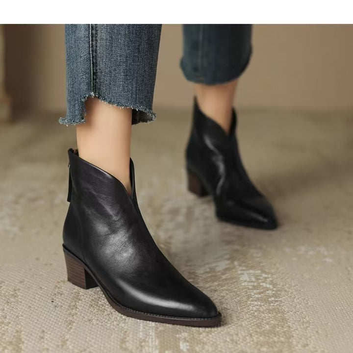 Damen nan spitze Chelsea-inspirierte Stiefelette mit asymmetrischem Schaft und mittelhohem Blockabsatz Echo Archiv
