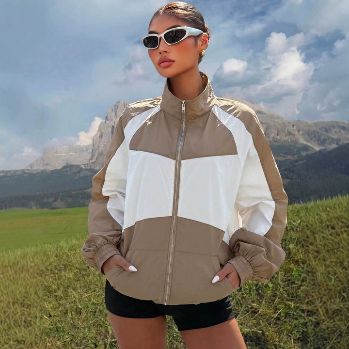 Damen Leichte Windbreaker-Jacke mit Stehkragen, Farbblock-Design und elastischen Bündchen Echo Archiv