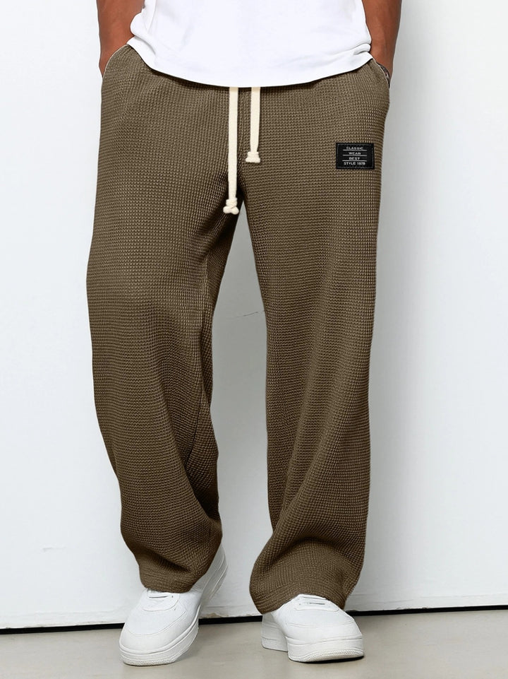 Herren nan lässige Waffelstruktur Lounge-Hose mit Kordelzug, elastischem Bund und weiter Passform Echo Archiv