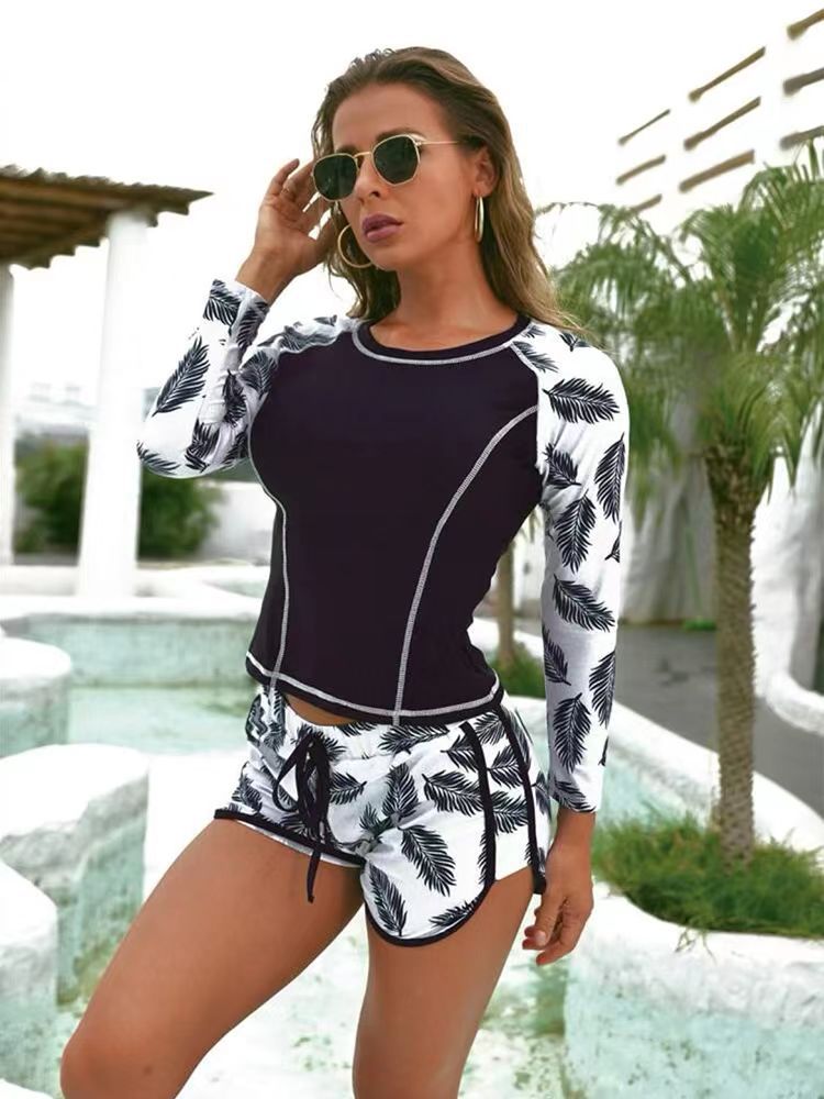 Damen Langarm Surf-Badeanzug mit floralem Muster Echo Archiv