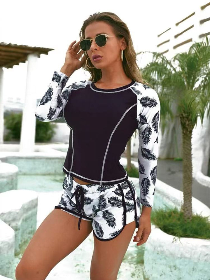 Damen Langarm Surf-Badeanzug mit floralem Muster Echo Archiv