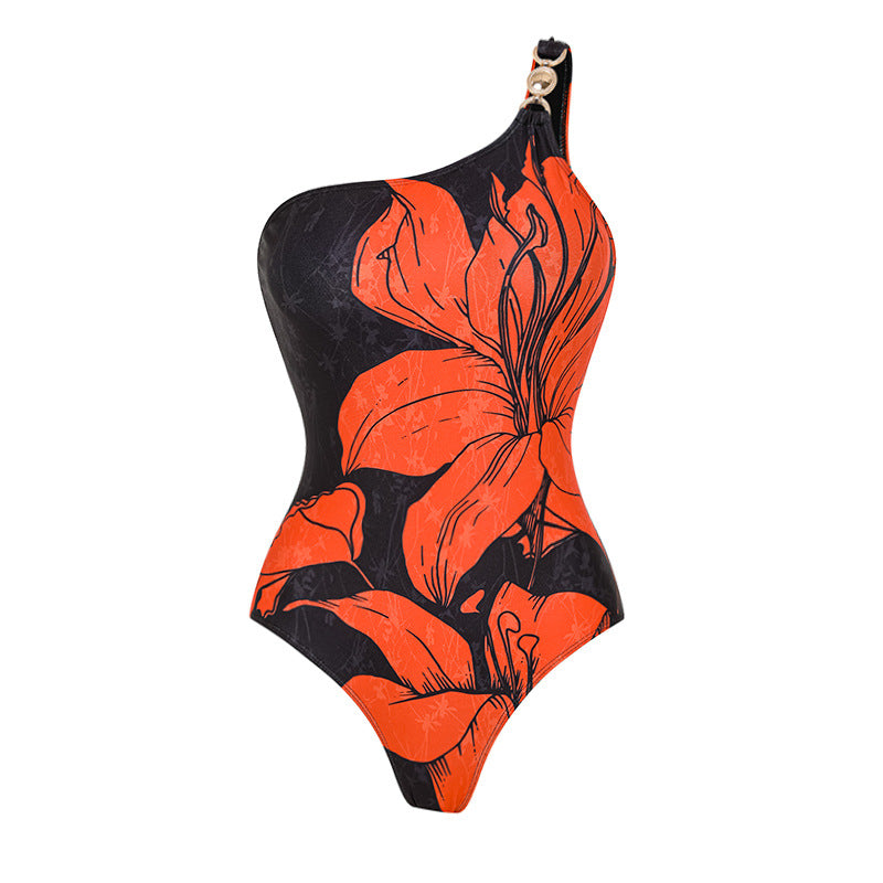 Damen Badeanzug mit asymmetrischem Schnitt und floralen Akzenten Echo Archiv