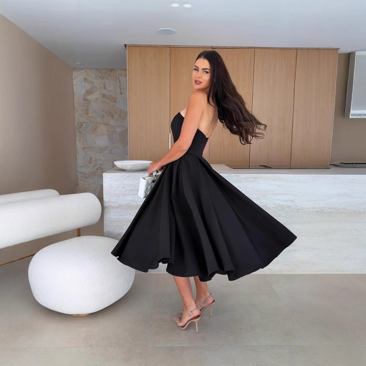 Damen A-linien Cocktailkleid mit trägerlosem Schnitt und schwingendem Rock Echoarchiv