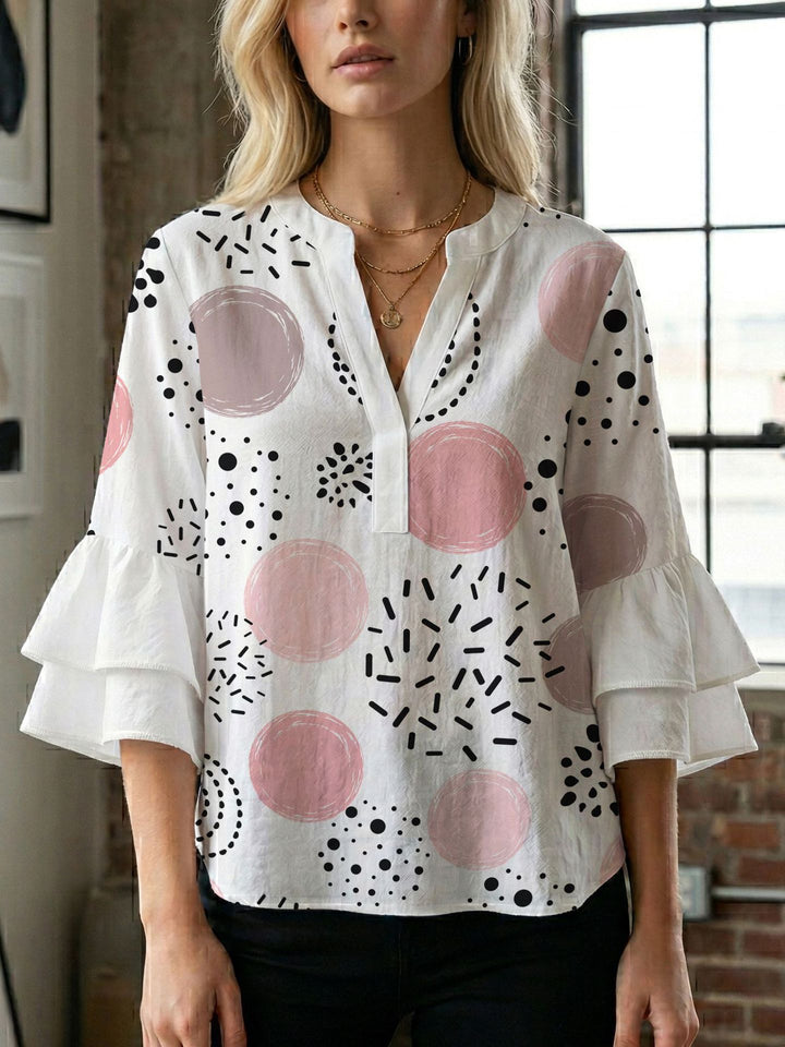 Damen Bluse mit voluminösen Flügelärmel und intensivem Blattmuster Echo Archiv
