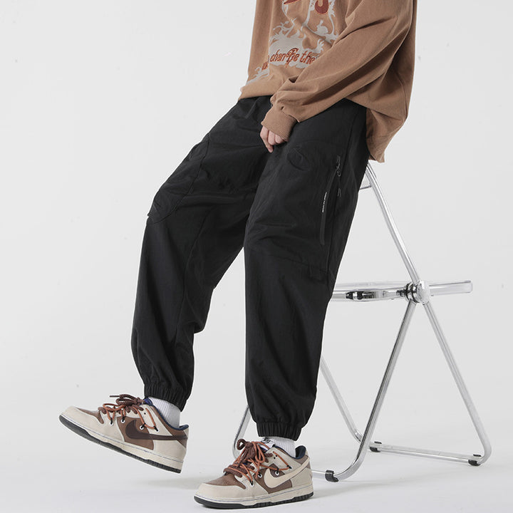 Herren Baggy-Tech-Cargo-Hose mit Ripstop‑Nylon, Knieabnähern & elastischem Bündchen Echoarchiv