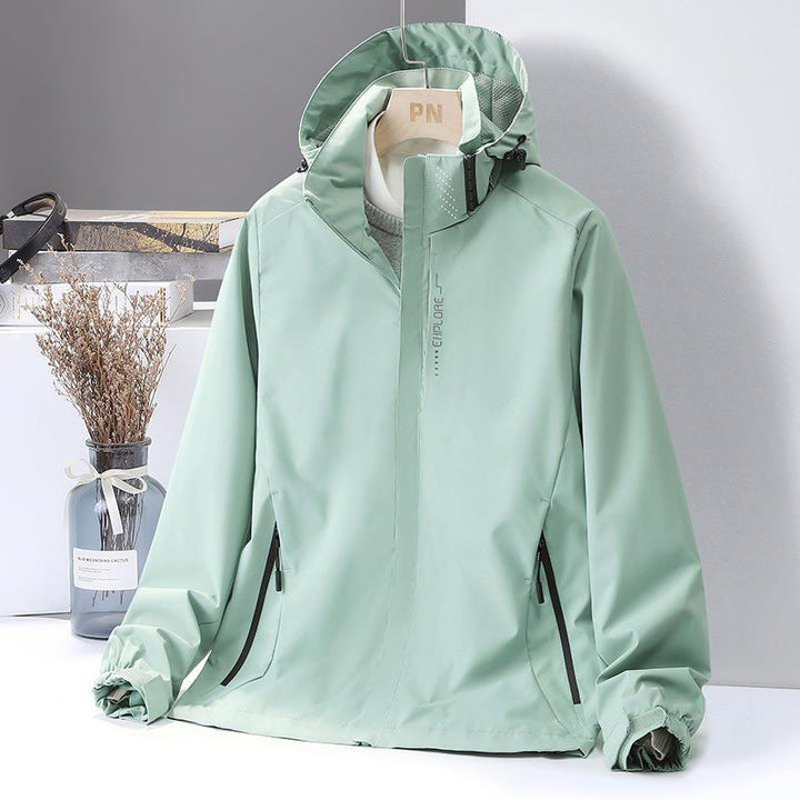 Damen Leichte Softshell-Kapuzenjacke mit winddichter Sturmleiste und verdeckten Reißverschlusstaschen – Célinea