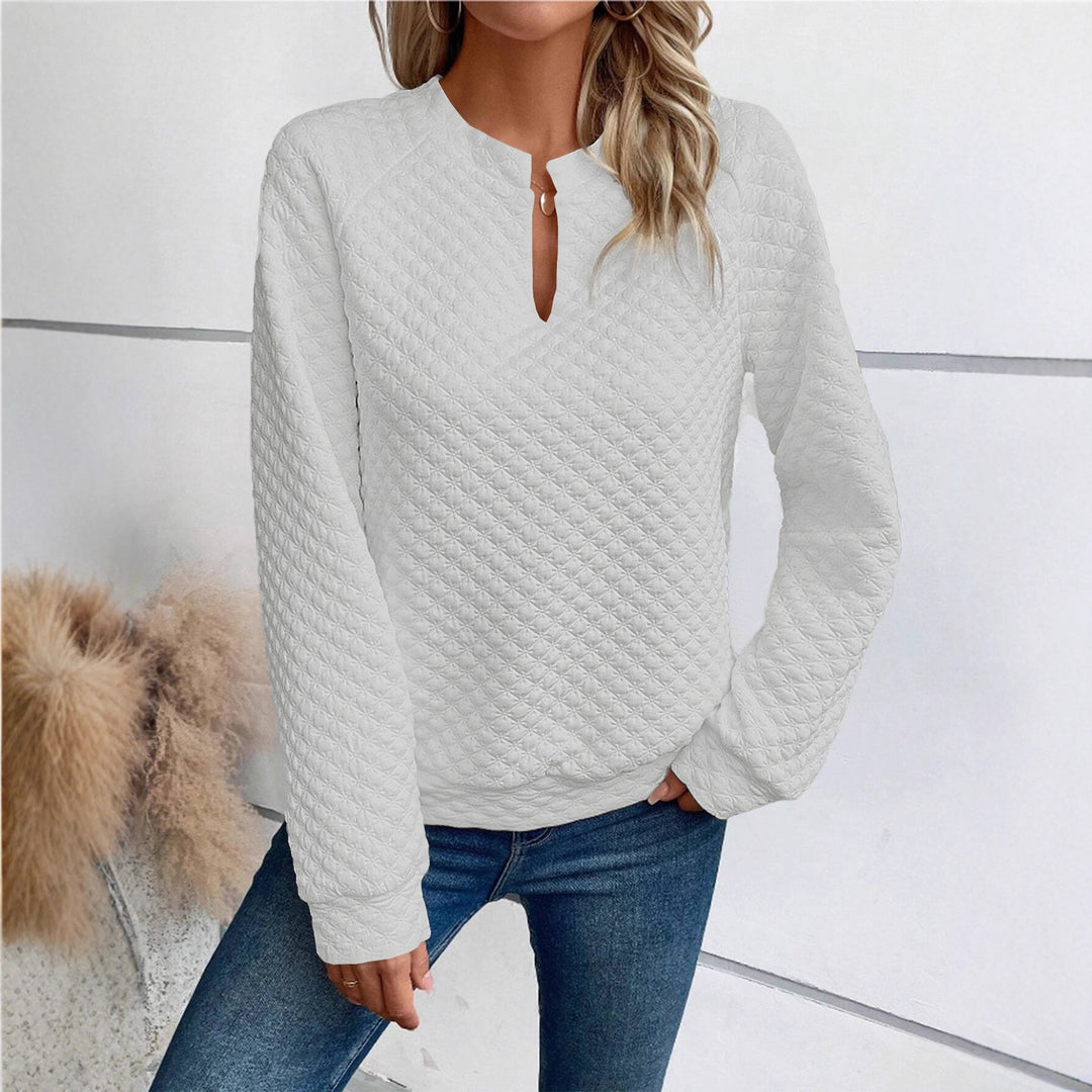 Damen Gestepptes Sweatshirt mit Schlitzkragen, Rautenstruktur und Raglanärmeln – Mavelle
