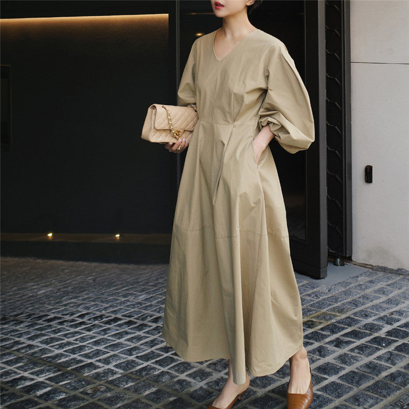 Damen Maxikleid mit weiten Ballonärmeln und seitlichen Eingrifftaschen Echoarchiv