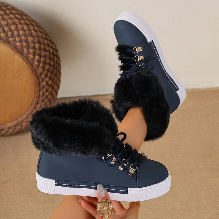 Damen Winterliche Sneaker-Stiefelette mit Kunstfellkragen und Plateau Echoarchiv