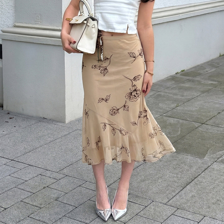 Damen Fließender Chiffon-Midirock mit zartem Blumenprint und asymmetrischem Volant – Rosévia