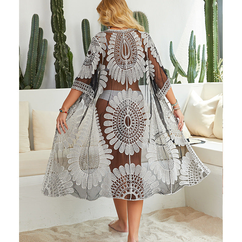 Damen Häkel-Strandüberwurf mit floralen Motiven und lockerem Schnitt Echo Archiv