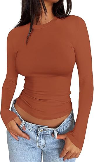 Damen Körpernahes Langarmshirt im Cropped-Look mit verlängerten Ärmeln und Daumenloch – Avérine