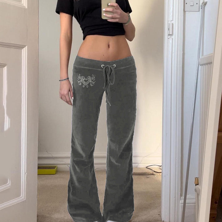 Damen Velours-Loungehose mit ausgestelltem Schlag, elastischem Tunnelzugbund und Hüftstickerei Echo Archiv