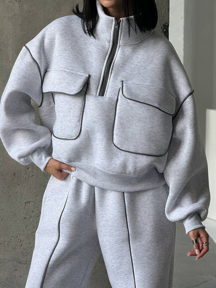 Damen nan Oversize Halbzip-Sweatshirt mit aufgesetzten Klappentaschen und Kontrastpaspeln Echo Archiv