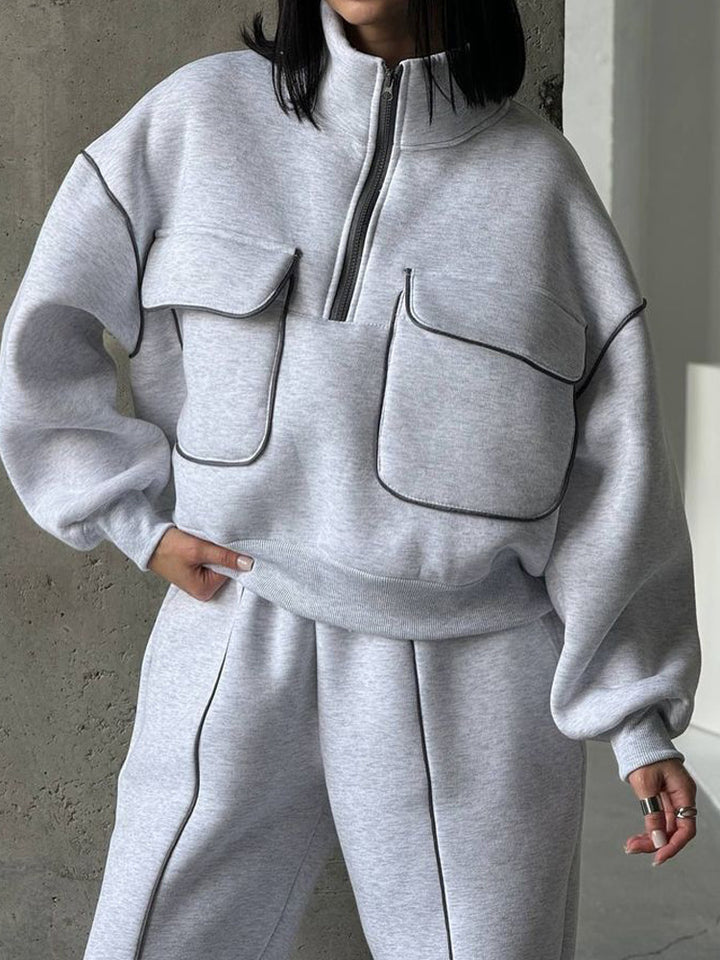 Damen nan Oversize Halbzip-Sweatshirt mit aufgesetzten Klappentaschen und Kontrastpaspeln Echo Archiv
