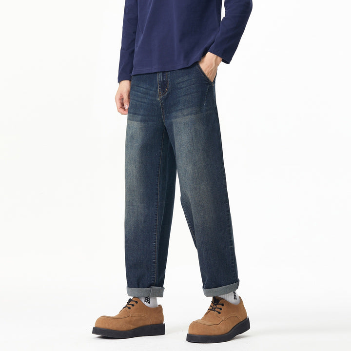 Herren Weite gerade geschnittene Denim-Jeans mit Used‑Wash und Umschlagbund Echoarchiv