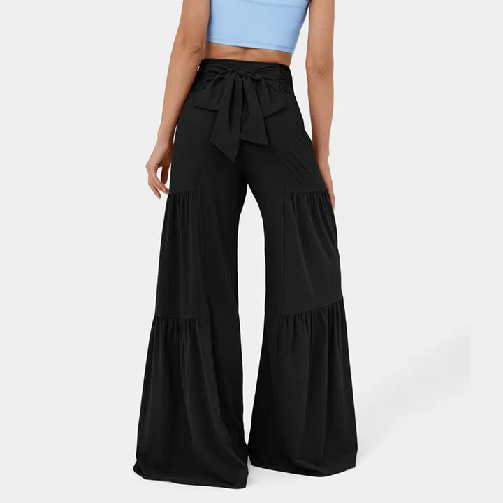 Damen weite Palazzo-Hose mit hoher Taille, bindbarem Taillenband und Stufensaum – Avérine