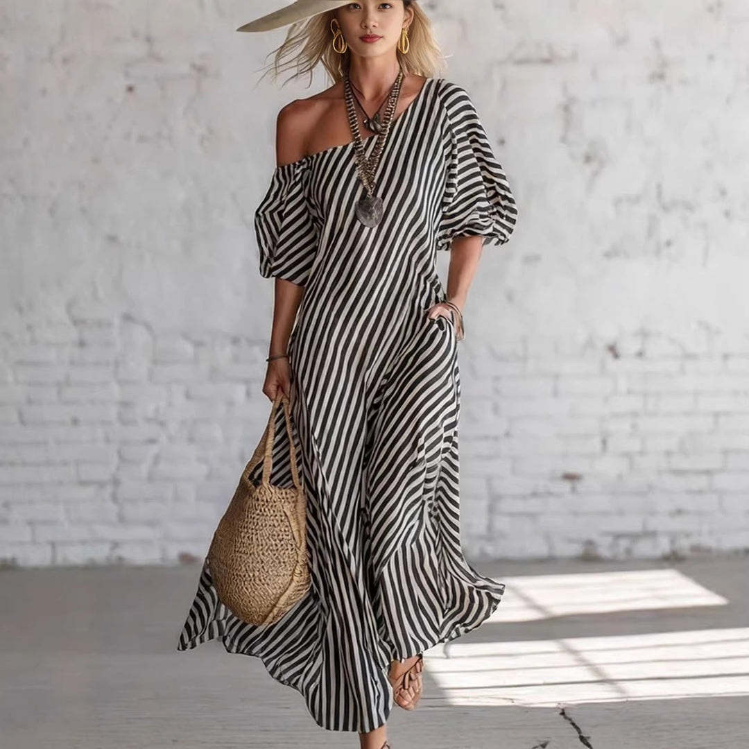 Damen Maxikleid mit asymmetrischem Schnitt und auffälligen Streifen Echo Archiv