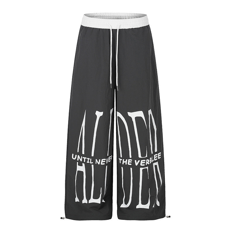 Damen Weite Loungewear-Hose mit hohem Komfortbund, Kordelzug, verstellbarem Saum und typografischem Print Echoarchiv
