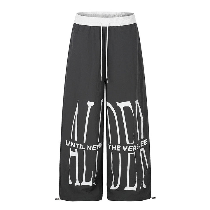 Damen Weite Loungewear-Hose mit hohem Komfortbund, Kordelzug, verstellbarem Saum und typografischem Print Echoarchiv