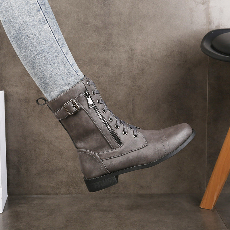 Damen nan knöchelhohe Vintage-Lederoptik Combat-Stiefelette mit seitlichem Reißverschluss, dekorativem Schnallenriemen und leichtem Blockabsatz Echo Archiv