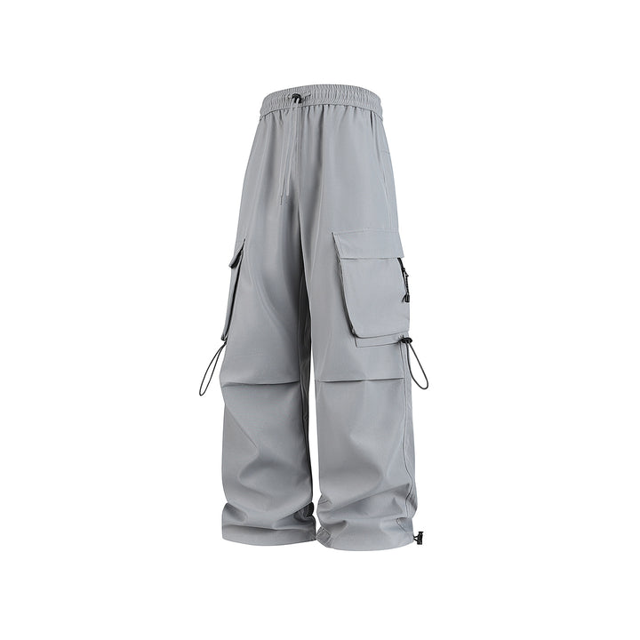 Herren Baggy‑Cargohose im Tech‑Utility‑Stil mit elastischem Tunnelzugbund, großen Klappfächern und Zipper‑Details Echo Archiv