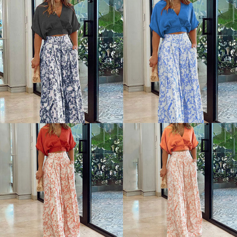 Damen Crop-Top Kombi-Anzug mit Weitem Rock und Floralem Muster Echoarchiv