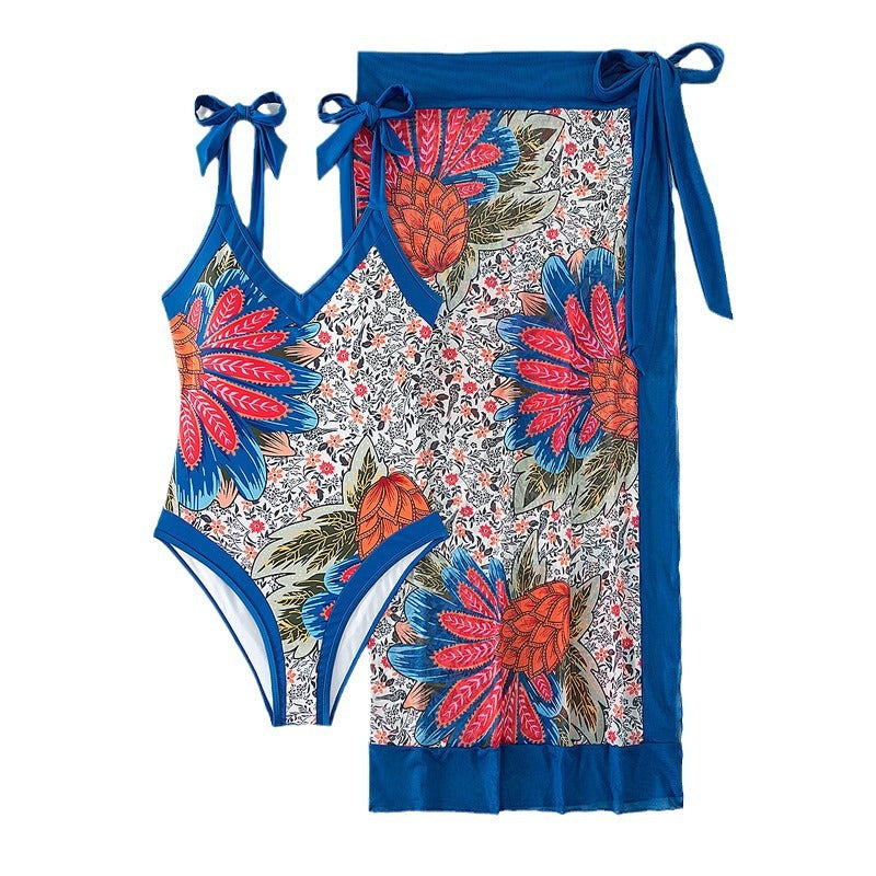 Damen Eleganter One-Piece Badeanzug mit floralem Wickeltuch Echo Archiv