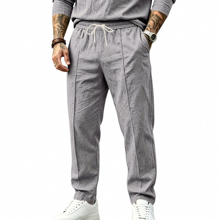 Herren Leichte Tapered-Jogginghose mit Bundfalten, elastischem Tunnelzug und Seitentaschen Echoarchiv