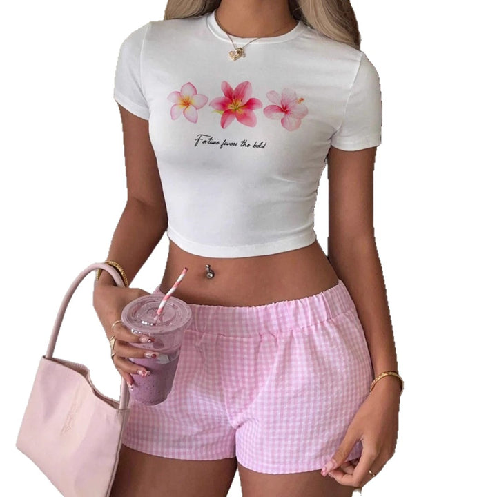 Damen Crop-Top mit floralem Druck und motivierendem Schriftzug Echo Archiv