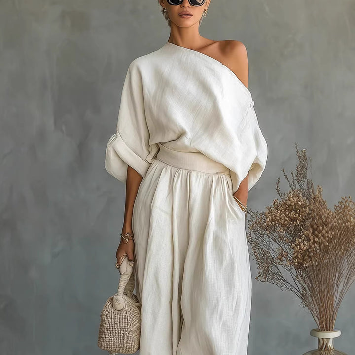 Damen Leinen-Set mit One-Shoulder-Oberteil und weiten Haremshosen Echoarchiv