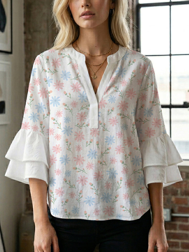 Damen Bluse mit voluminösen Flügelärmel und intensivem Blattmuster Echo Archiv