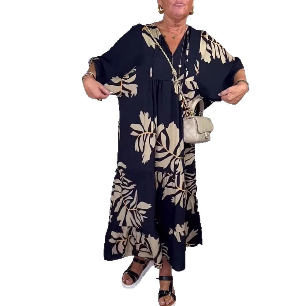 Damen nan lockeres Stufenmidikleid mit V-Ausschnitt und großflächigem Blumenprint Echo Archiv