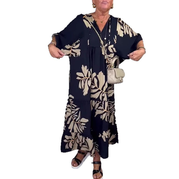 Damen nan lockeres Stufenmidikleid mit V-Ausschnitt und großflächigem Blumenprint Echo Archiv