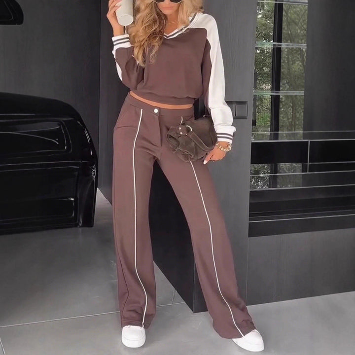 Damen nan sportlich-elegantes Zweiteiler-Set aus Baumwollmix mit V-Ausschnitt Sweatpullover und hochgeschnittener Schlaghose Echo Archiv