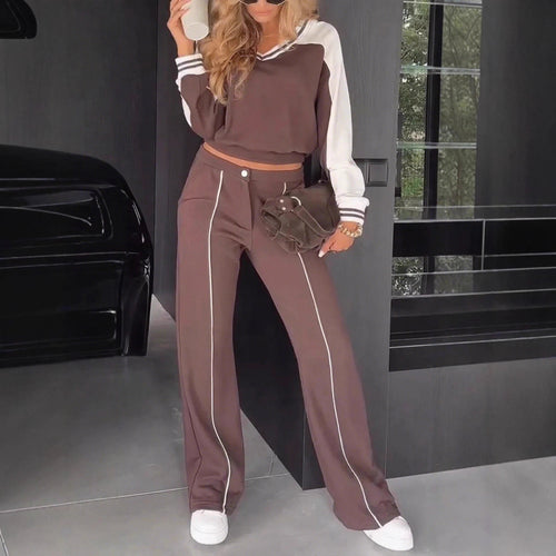 Damen nan sportlich-elegantes Zweiteiler-Set aus Baumwollmix mit V-Ausschnitt Sweatpullover und hochgeschnittener Schlaghose Echo Archiv